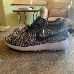 Grey and black Nike fly knit shoes